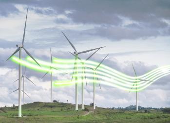 Wind turbines on hill with glowlines