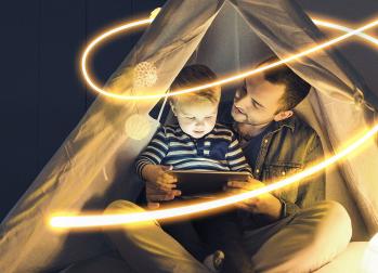 National Grid ESO - Electricity explained- father with child in tent in dark